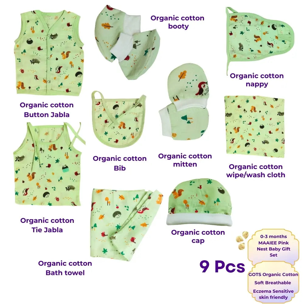 Maaiee green forest newborn set of nine pieces arranged with soft organic cotton baby essentials