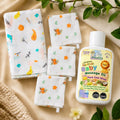 maaiee cow ghee massage oil and swaddle wipes set for newborns.