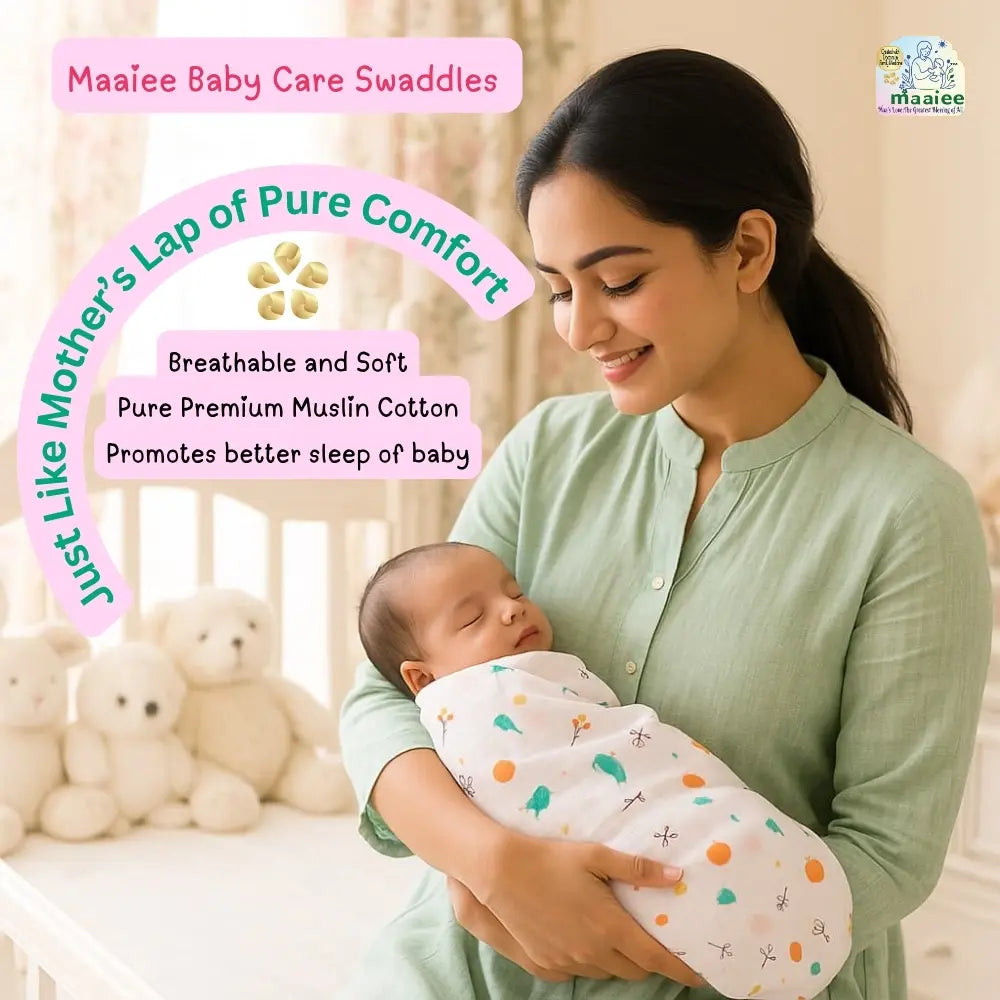 Mom holding baby wrapped in a soft Maaiee organic muslin swaddle.