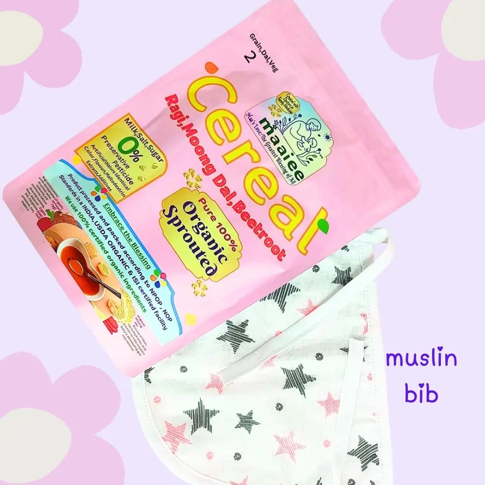 Maaiee organic sprouted Ragi Moong Dal Beetroot porridge shown with an organic bib in a clean, simple gift-style set.